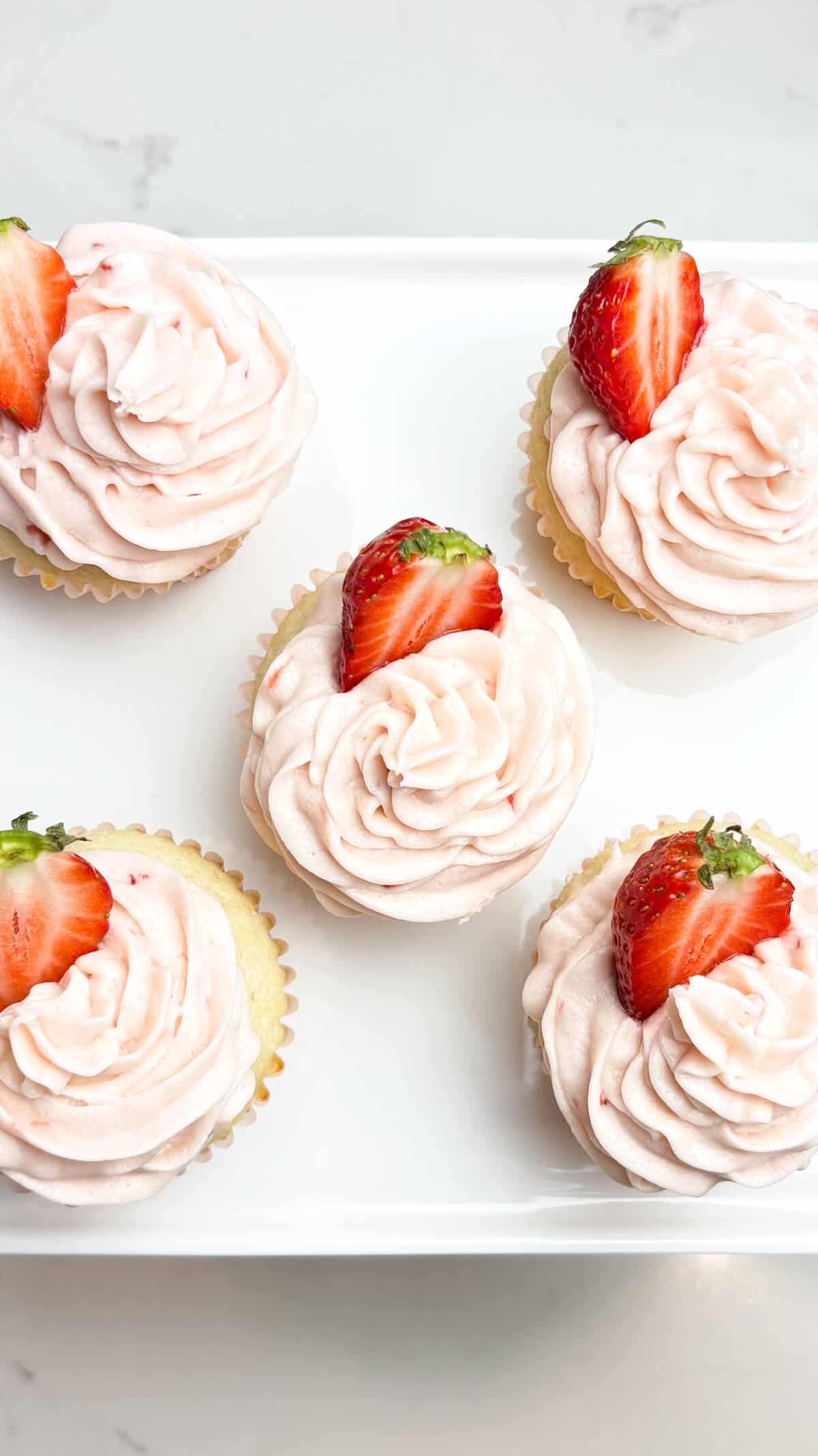 Finished cupcakes on a plate.