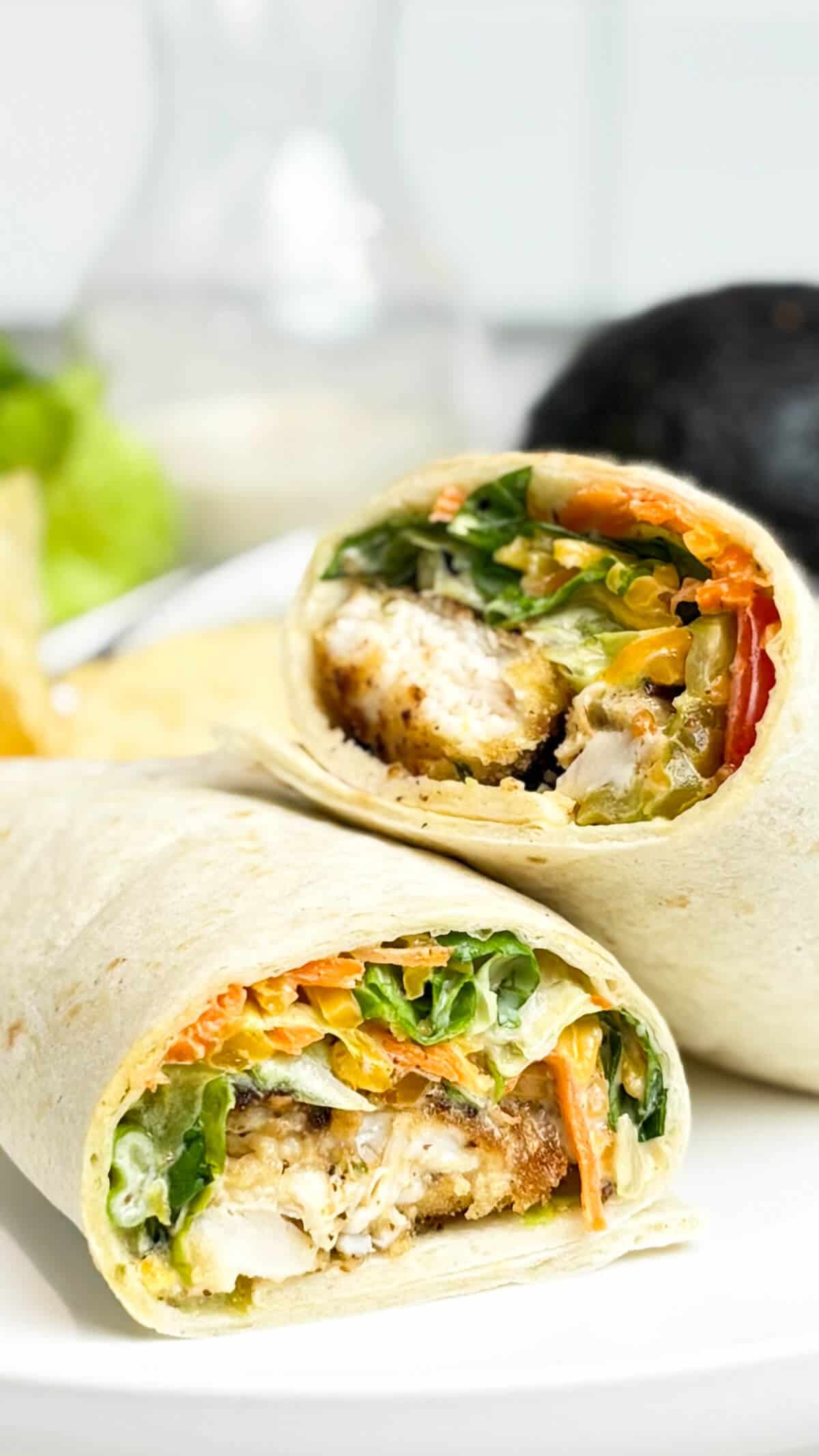 Wrap sandwich cut in half.